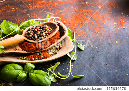 wooden spoons with spices and herbs 115034678