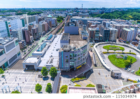 Yokohama cityscape in Japan, overlooking Center-Kita Station and Center-Minami Station (in the background) amidst fresh greenery Yokohama cityscape in Japan, overlooking Center-Kita Station and Center-Minami Station (in the background) amidst fresh greenery 115034974