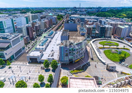 Yokohama cityscape in Japan, overlooking Center-Kita Station and Center-Minami Station (in the background) amidst fresh greenery Yokohama cityscape in Japan, overlooking Center-Kita Station and Center-Minami Station (in the background) amidst fresh greenery 115034975