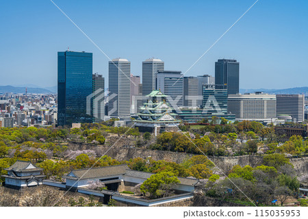 [Cityscape] Osaka Castle Park and the OBP buildings in spring [Osaka Castle Tower] 115035953