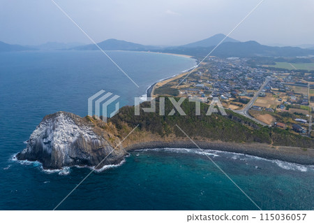 Aerial view of Keya no Daimon, a strangely shaped rock with columnar joints facing the Genkai Sea|Drone shot|Itoshima City, Fukuoka Prefecture Aerial view of Keya no Daimon, a strangely shaped rock with columnar joints facing the Genkai Sea|Drone shot|Itoshima City, Fukuoka Prefecture 115036057
