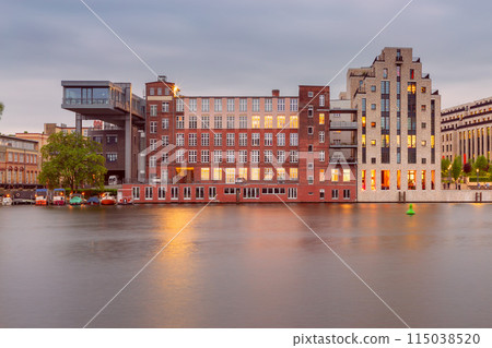 Embankment along the Spree river in the historical part of Berlin at sunset. Germany. 115038520