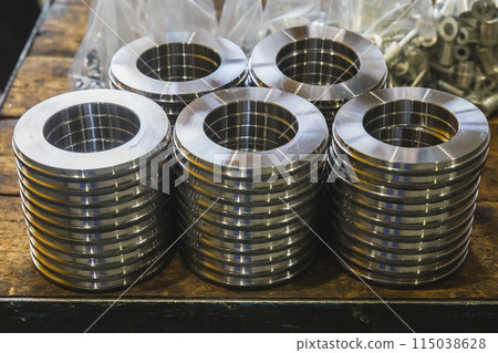 Round metal parts made on a lathe. Acoustic speaker blanks 115038628