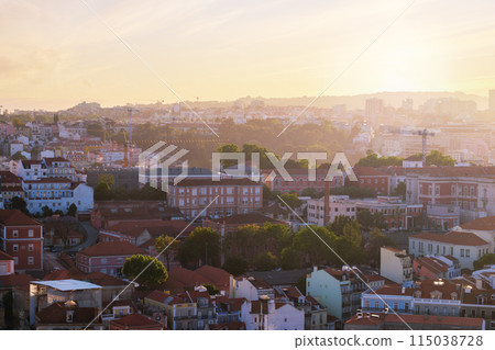 Sunset contre-jour view of Lisbon from Miradouro da Senhora do Monte viewpoint. Lisbon, Portugal Sunset contre-jour view of Lisbon from Miradouro da Senhora do Monte viewpoint. Lisbon, Portugal 115038728