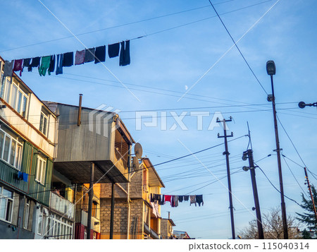 laundry is dried on clothesline. City environment. Asian city streets. Linen is dried in the open air. 115040314