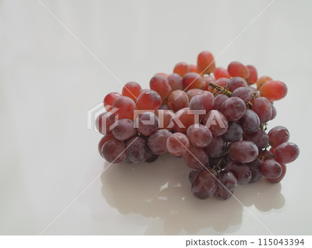 Red seedless grapes (white background) Red seedless grapes (white background) 115043394