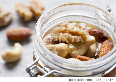 Nuts pickled in honey 115044217