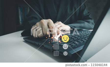 Satisfaction concept of customer, using laptop to express their opinions, answers and satisfied scores, client is satisfied with pressing smile face icon, excellent service, good feedback from user 115048144