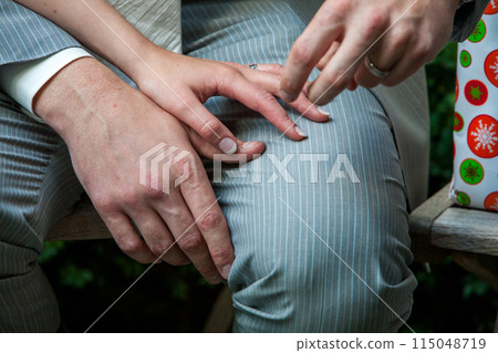 Intimate Moment of Ring Exchange captures love, commitment, connection, and bond during a wedding Intimate Moment of Ring Exchange captures love, commitment, connection, and bond during a wedding 115048719