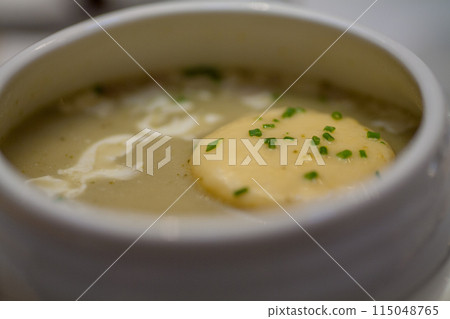 Try the tasty Creamy Potato Soup with Chives for a comforting winter meal served in a bowl 115048765