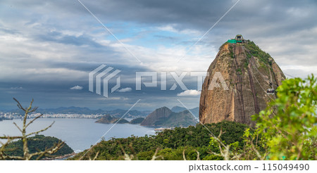 Cable Car Over Sugarloaf Mountain on a Cloudy Rio Day Cable Car Over Sugarloaf Mountain on a Cloudy Rio Day 115049490