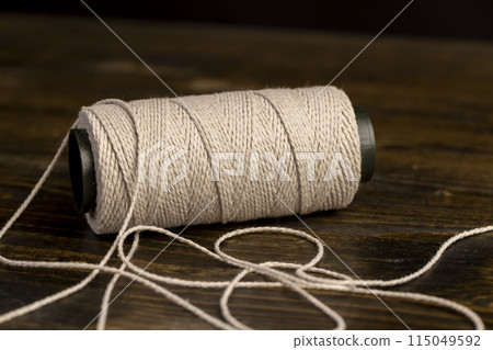 thin cotton thread for use in cooking 115049592