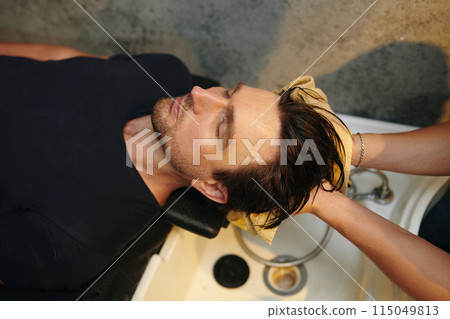 Man Having Hair Washed 115049813