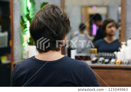 Man visiting barbershop Man visiting barbershop 115049963
