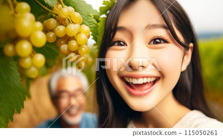 Young woman enjoying grape picking in an orchard Young woman enjoying grape picking in an orchard 115050261