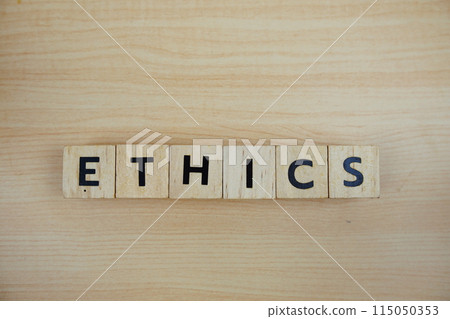 ETHICS alphabet letters top view on wooden background ETHICS alphabet letters top view on wooden background 115050353