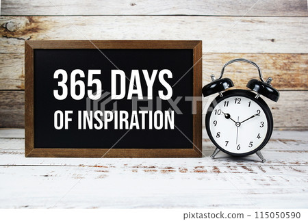 365 days of inspiration quotes text message and alarm clock on wooden background 365 days of inspiration quotes text message and alarm clock on wooden background 115050590