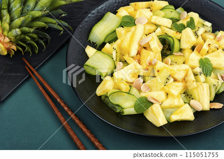 Pineapple, cucumber salad, healthy, clean food. 115051755