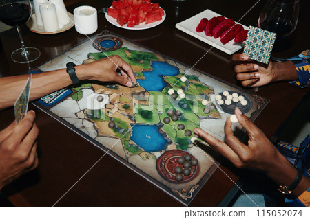 Friends Playing Board Game 115052074