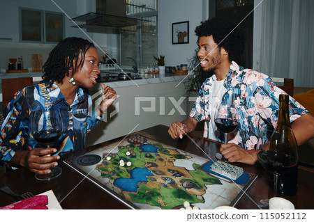 Couple Playing Board Game Couple Playing Board Game 115052112