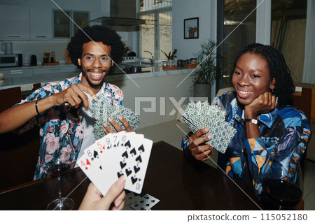 Friends Playing Cards at Home Friends Playing Cards at Home 115052180