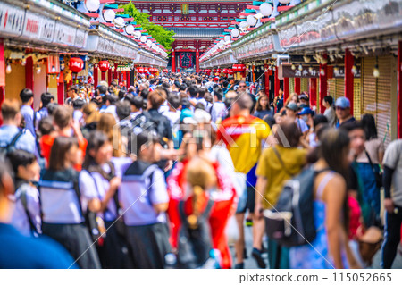 Tokyo cityscape in Japan: Senso-ji Temple in the morning crowded with tour groups, children, and foreign tourists on May 30th Tokyo cityscape in Japan: Senso-ji Temple in the morning crowded with tour groups, children, and foreign tourists on May 30th 115052665