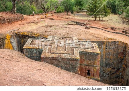 Rock hewn monolithic ortodox church of Saint George with cross roof shape, Lalibela, Amhara Region, Ethiopia. 115052875