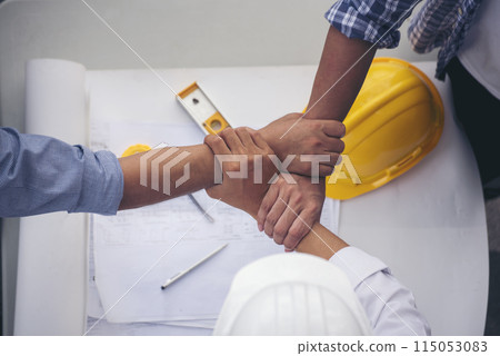 Group of multiracial people Teamwork meeting join hands Engineer Manager Foreman fist bump together. Close up diversity engineer people hands partner teams. Business connection team join partnership 115053083