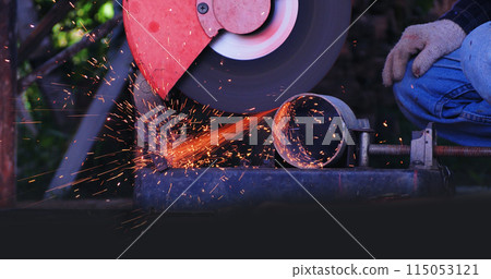 Welding machinery iron metal sparking equipment. Hot flame welding metal work cutting fire iron workshop. Locksmith using Welding machine cutting metal process grinder. Heavy Engineer metalworking Welding machinery iron metal sparking equipment. Hot flame welding metal work cutting fire iron workshop. Locksmith using Welding machine cutting metal process grinder. Heavy Engineer metalworking 115053121
