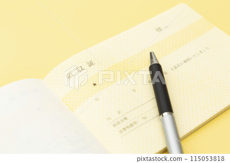 Receipt on a yellow background 115053818