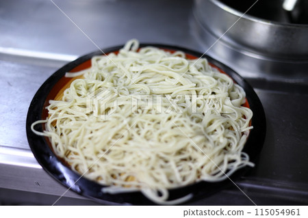 The soba noodles are ready for the handmade soba experience. The noodles are slightly thick. 115054961