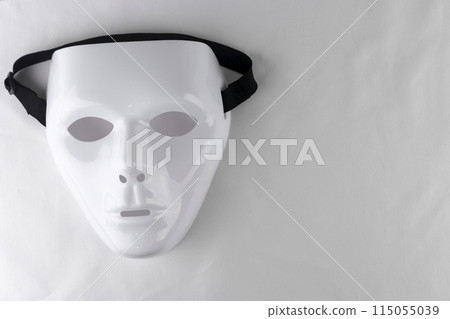 White mask photographed in the dark White mask photographed in the dark 115055039