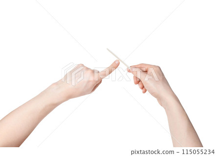 Man do manicure at home. Nail file. Self hand routine. Male finger procedure 115055234