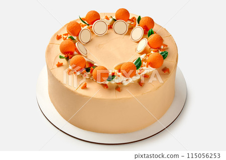Orange-themed honey cake with whipped sour cream and chocolate decoration Orange-themed honey cake with whipped sour cream and chocolate decoration 115056253