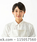 A woman in an apron 115057560