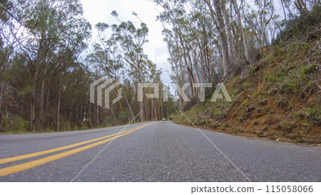 In this serene winter scene, a vehicle carefully makes its way along Los Osos Valley Road and Pecho Valley Road within Montana de Oro State Park. 115058066