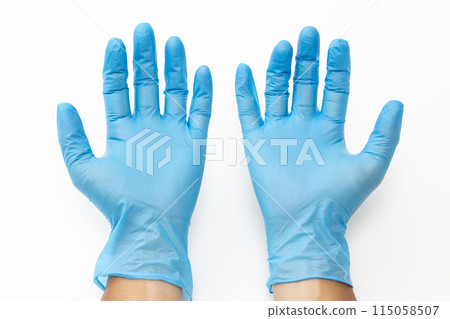Male hand wearing rubber glove 115058507
