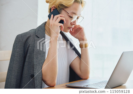 Woman doing work at home Woman doing work at home 115059128