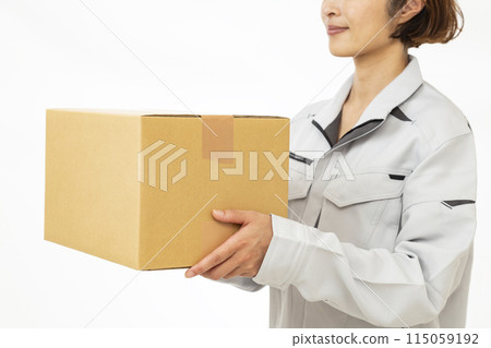 A woman with a cardboard box 115059192