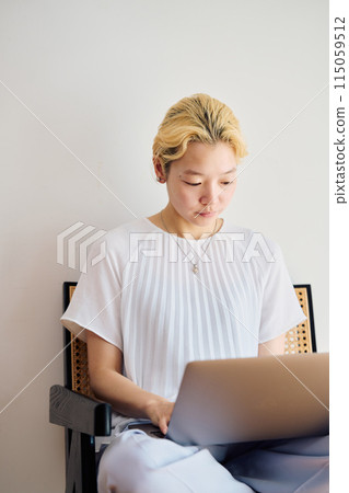 A woman working at home at home 115059512