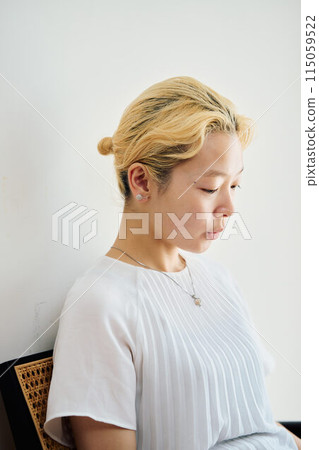 A woman working at home at home A woman working at home at home 115059522