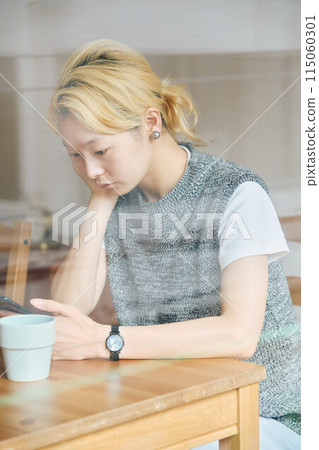 A woman relaxing in the room A woman relaxing in the room 115060301