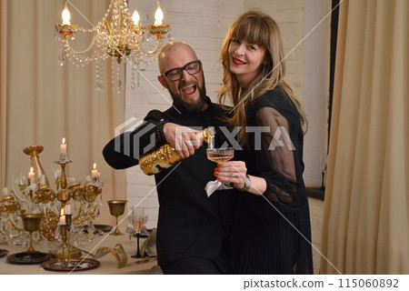 A large family with children posing in pajamas in New Year's locations. A large family with children posing in pajamas in New Year's locations. 115060892