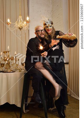 A large family with children posing in pajamas in New Year's locations. A large family with children posing in pajamas in New Year's locations. 115060907