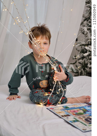 A large family with children posing in pajamas in New Year's locations. 115060949