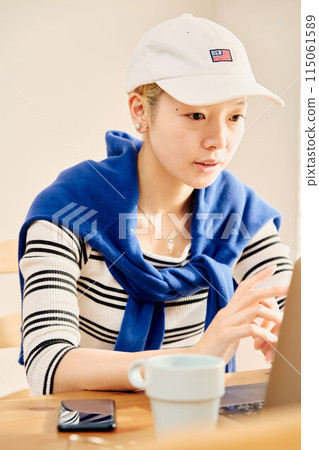A woman working from home in a casual style A woman working from home in a casual style 115061589