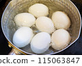Boil eggs in an aluminum pot 115063847