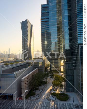 Sunset over Abu Dhabi's skyline at Al Maryah Island in the United Arab Emirates 115064443