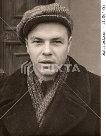 Retro portrait of a stylish young man in a cap. The USSR. Circa 1955. 115064458