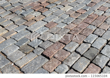 Background texture of an old cobblestone road Background texture of an old cobblestone road 115065104